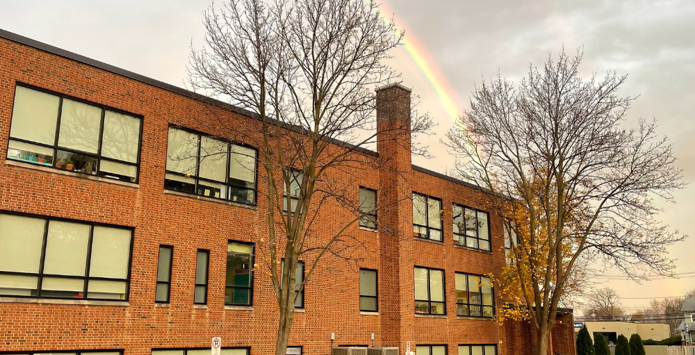 A beautiful rainbow graced the morning sky, and it just so happened to be directly overhead of Syracuse Academy of Science elementary school.