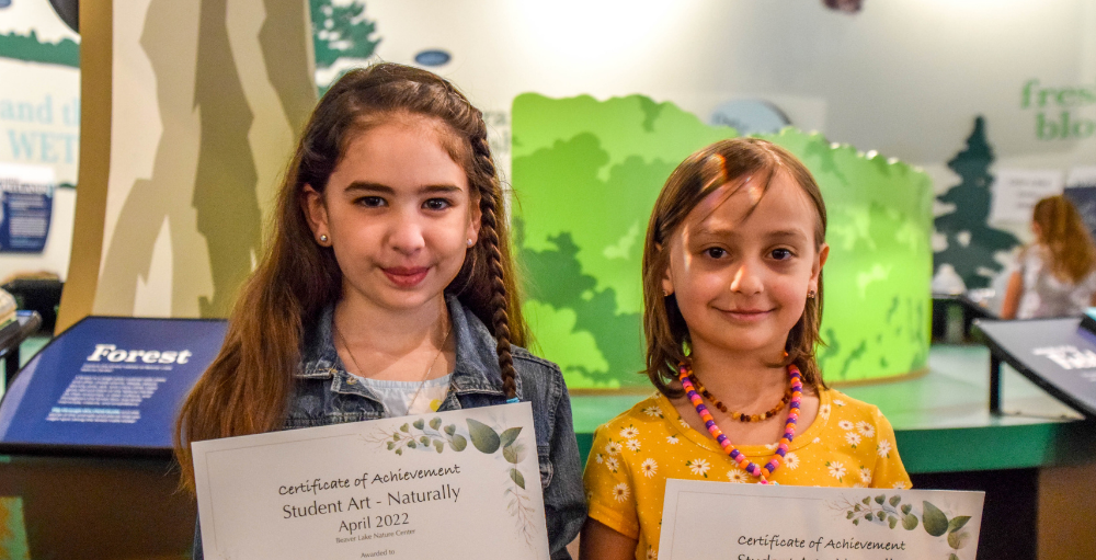 Syracuse Academy of Science elementary school students' celebrate their achievements of having artwork displayed at the Beaver Lake Nature Center’s Art Naturally Show hosted by NYSATA Region 3.