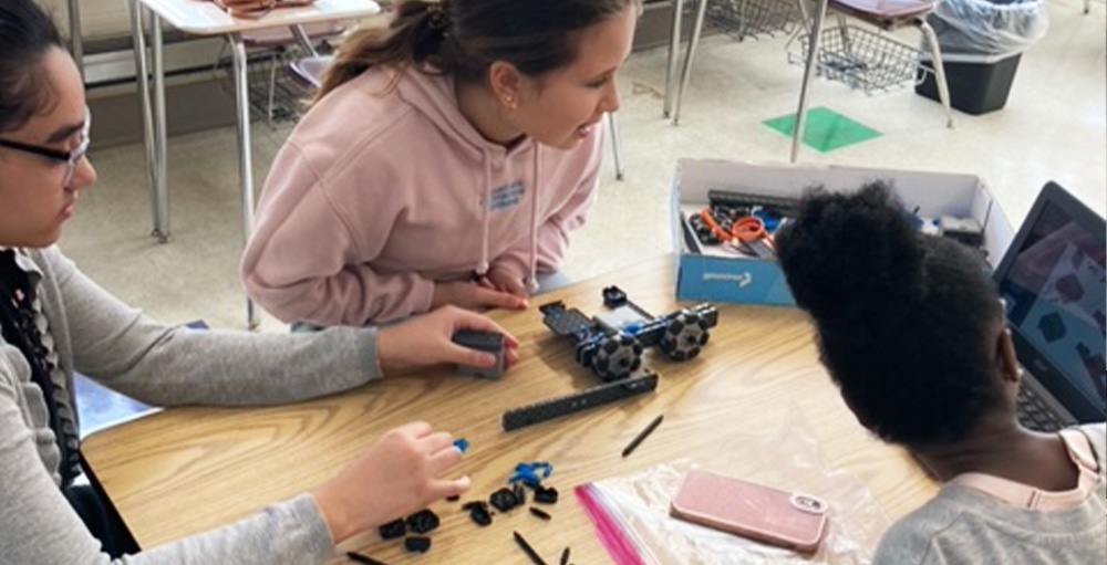 Syracuse Academy of Science Middle School Robotics Team Building Robots for this Year's Vex IQ Competition